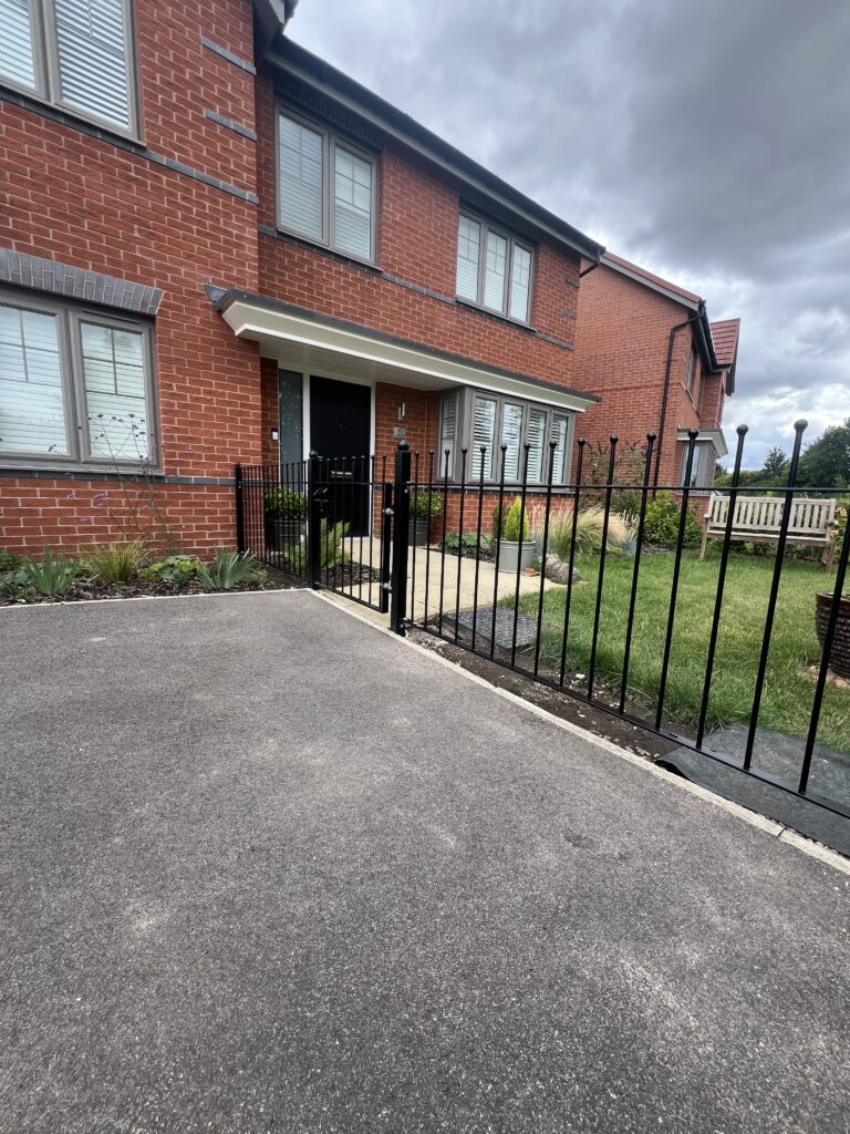 Metal railing fence providing safety and boundary protection.