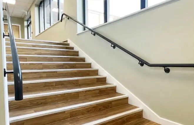 Child-safe handrails installed for a primary school in Humberstone. Fencing services provided by Direct Fencing & Contracting